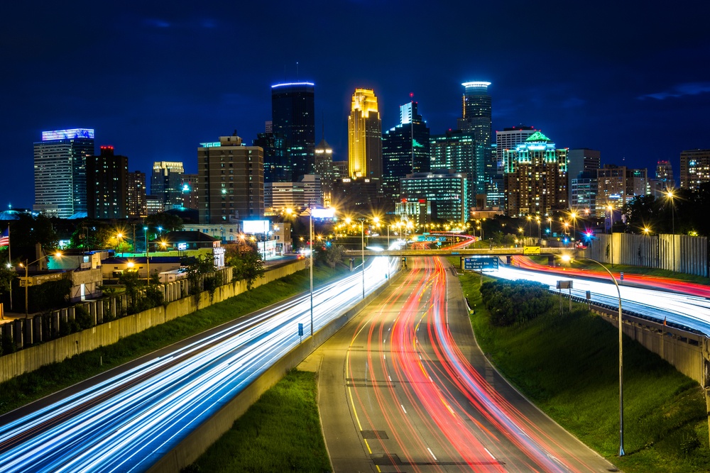 I-35 and the skyline at night, seen from the 24th Street Pedestrian Bridge, in Minneapolis, Minnesota.