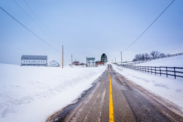 Snow covered farm along a country road in rural York County, Pennsylvania.